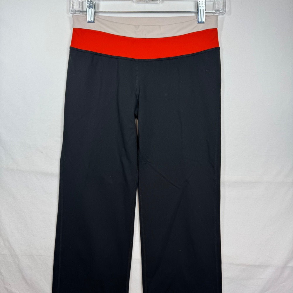 Patagonia Women Black Wide Leg Pliant Yoga‎ Pants Orange Tan Fold Over Sz Small